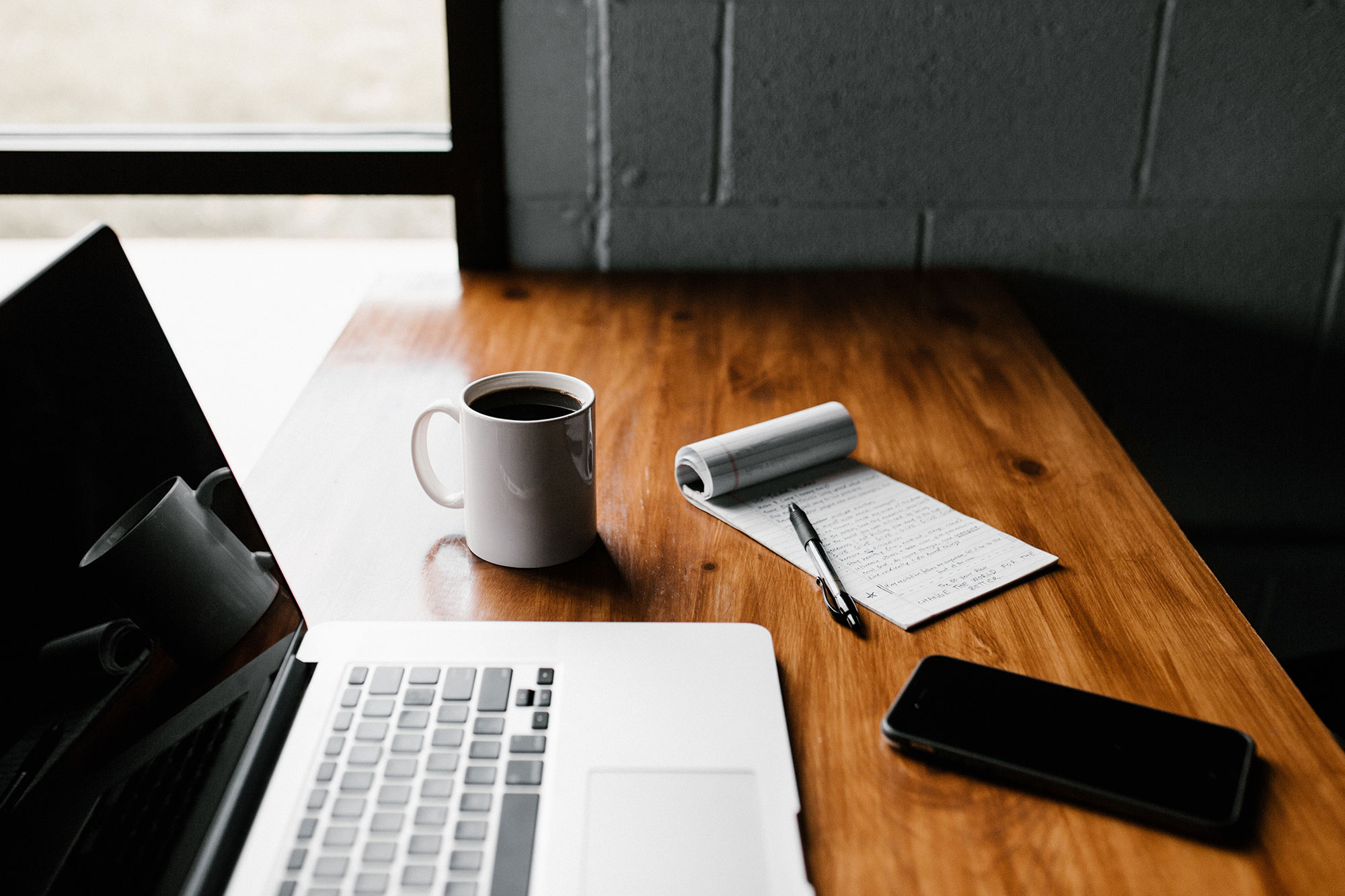 A relaxed morning coffee — payroll handled while you focus